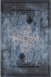 Син вълнен килим 133x180 cm Difida – Agnella