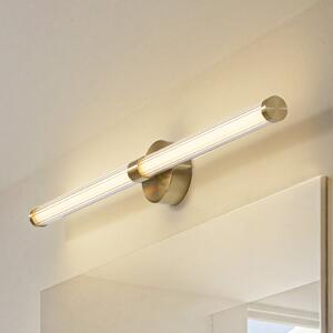 Lucande LED стенна лампа Melisa, златна, 90 cm, CCT, IP44, Злато / месинг, Баня, Стъкло, Модерен