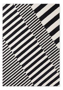 Черно-бял ръчно изработен вълнен килим 120x180 cm Stryve Flux – Elle Decoration