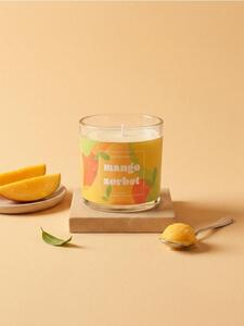 Sinsay - Ароматизирана свещ Mango sorbet - светлооранжево
