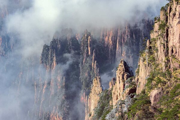 Флизелинов фототапет облаци над върхове 375 x 250 см