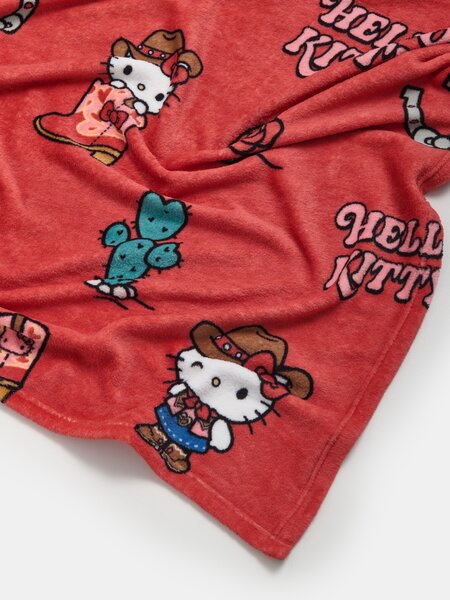 Sinsay - Одеяло с каубойски мотив Hello Kitty - червeн