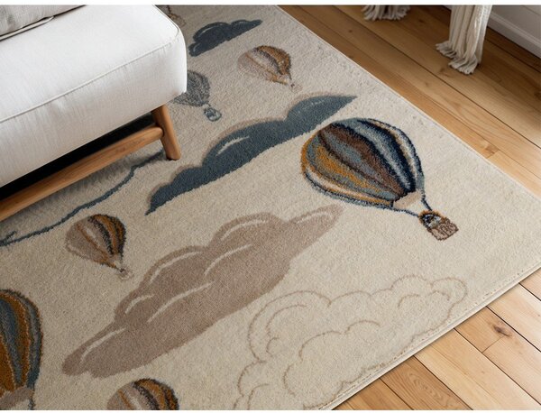 Кремав детски килим 120x170 cm Hot Air Balloon – Hanse Home