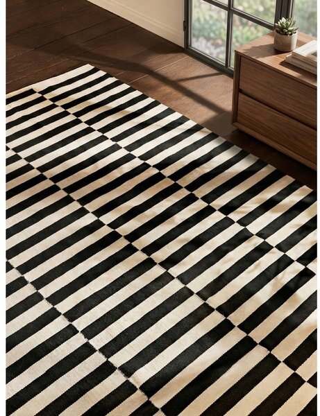 Черно-бял двустранен ръчно изработен вълнен килим 200x300 cm Donna – Hanse Home