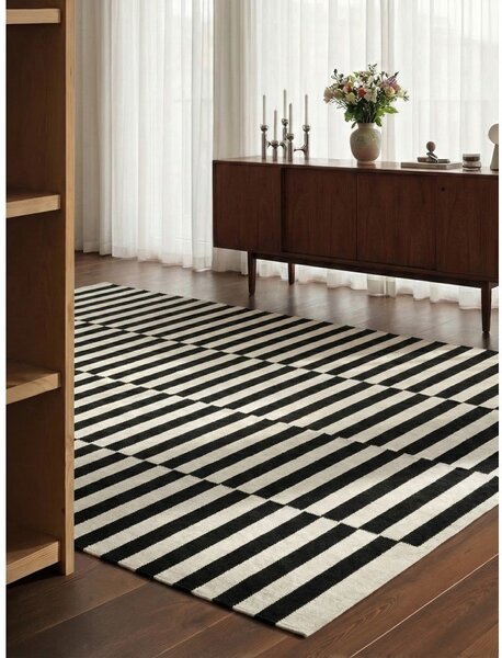 Черно-бял двустранен ръчно изработен вълнен килим 200x300 cm Donna – Hanse Home