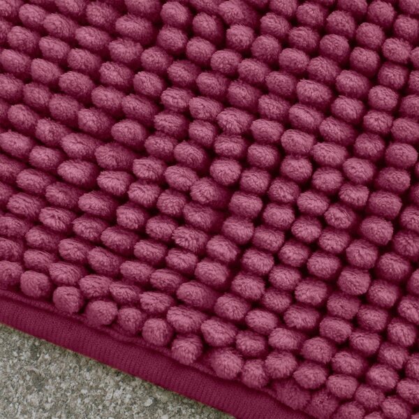 Тъмнорозов килим за баня 50x80 cm Bobble – Catherine Lansfield