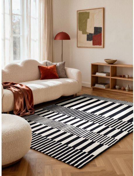 Черно-бял ръчно изработен вълнен килим 120x180 cm Stryve Pulse – Elle Decoration