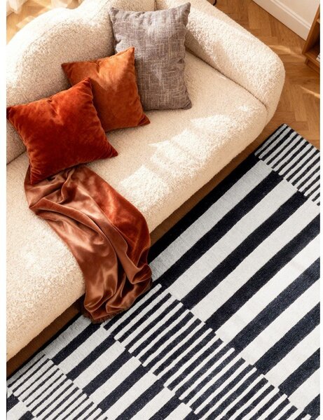 Черно-бял ръчно изработен вълнен килим 120x180 cm Stryve Pulse – Elle Decoration