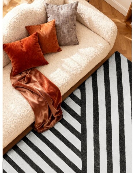 Черно-бял ръчно изработен вълнен килим 120x180 cm Stryve Noir – Elle Decoration
