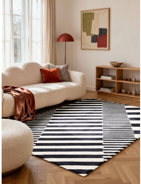 Черно-бял ръчно изработен вълнен килим 120x180 cm Stryve Flux – Elle Decoration