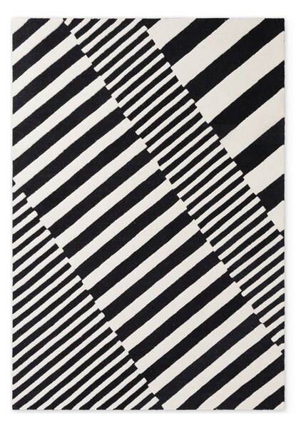 Черно-бял ръчно изработен вълнен килим 120x180 cm Stryve Flux – Elle Decoration