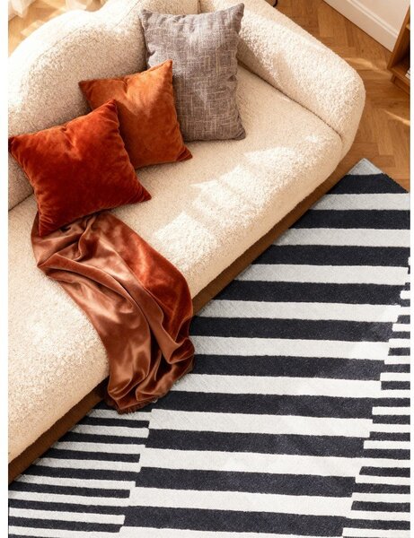 Черно-бял ръчно изработен вълнен килим 120x180 cm Stryve Flux – Elle Decoration