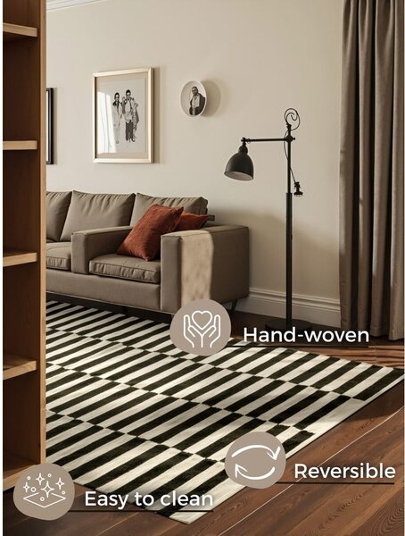 Черно-бял двустранен ръчно изработен вълнен килим 200x300 cm Donna – Hanse Home