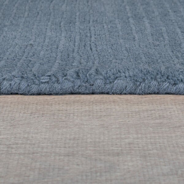 Тъмносин ръчно изработен вълнен килим 120x170 cm Textured Wool Border – Flair Rugs