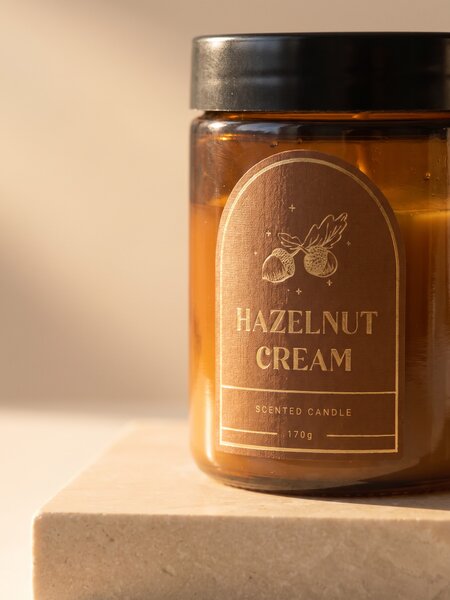 Sinsay - Ароматизирана свещ Hazelunt Cream - златистокафяво