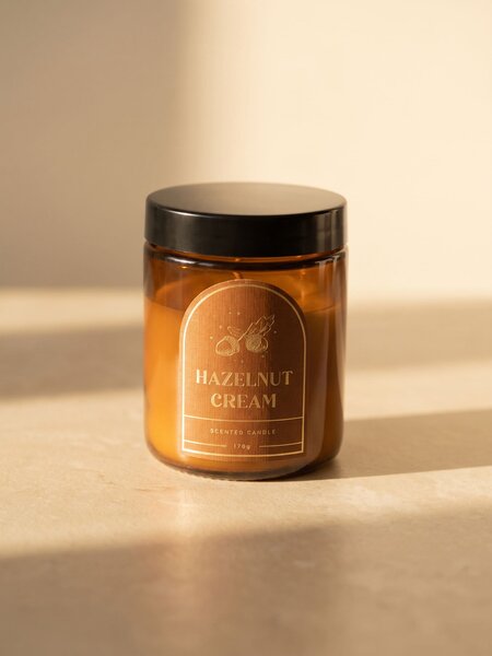 Sinsay - Ароматизирана свещ Hazelunt Cream - златистокафяво